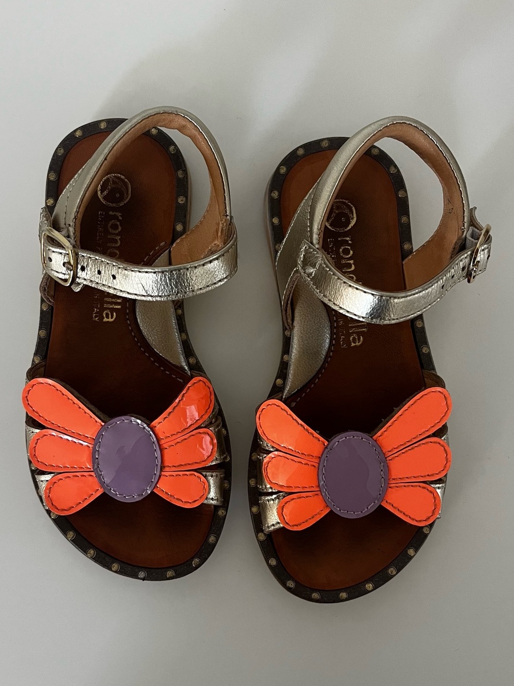 Girls Metallic Gold Sandals with Orange & Purple Flower Accent